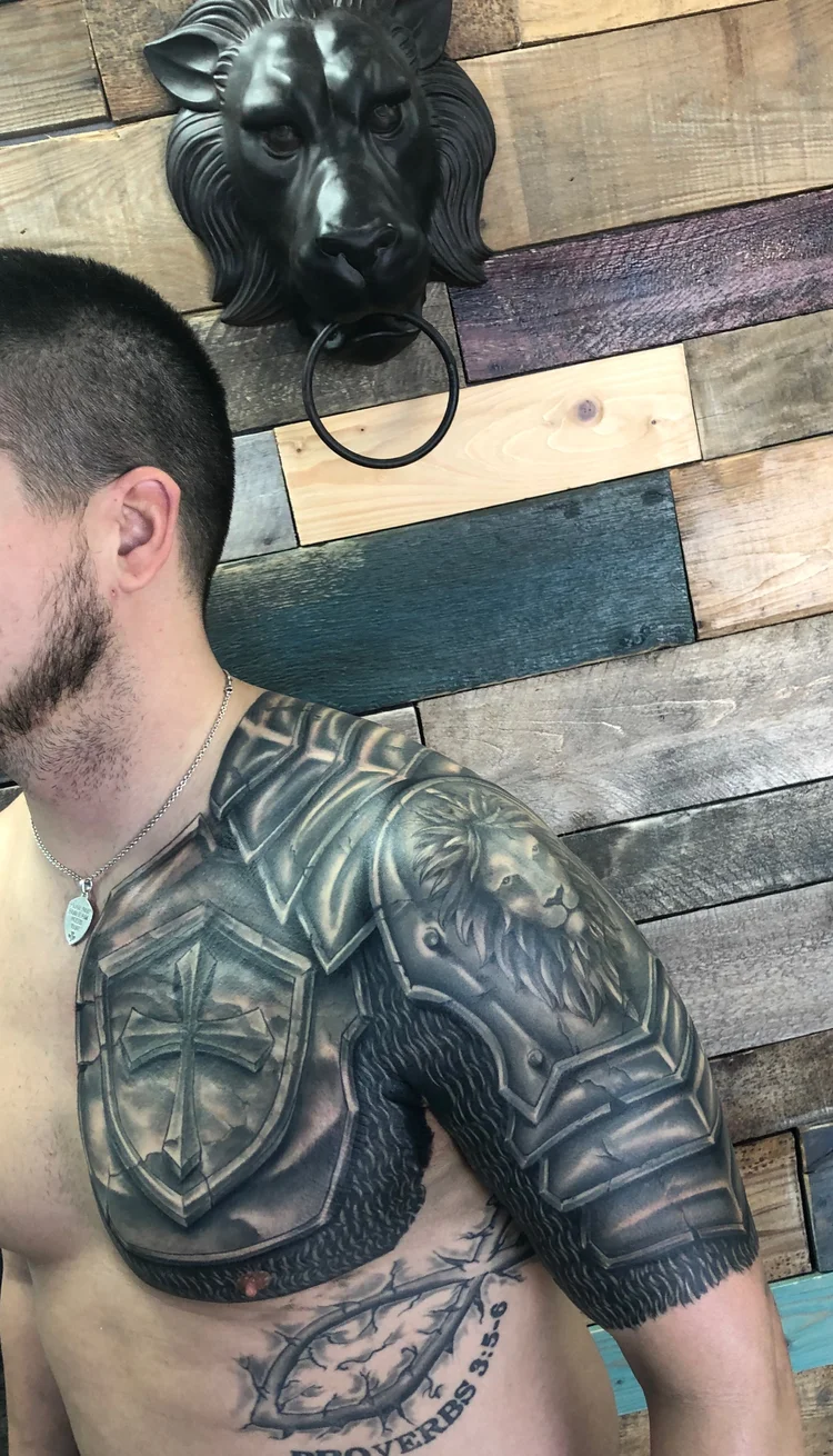 Black and grey armor shoulder and chest piece